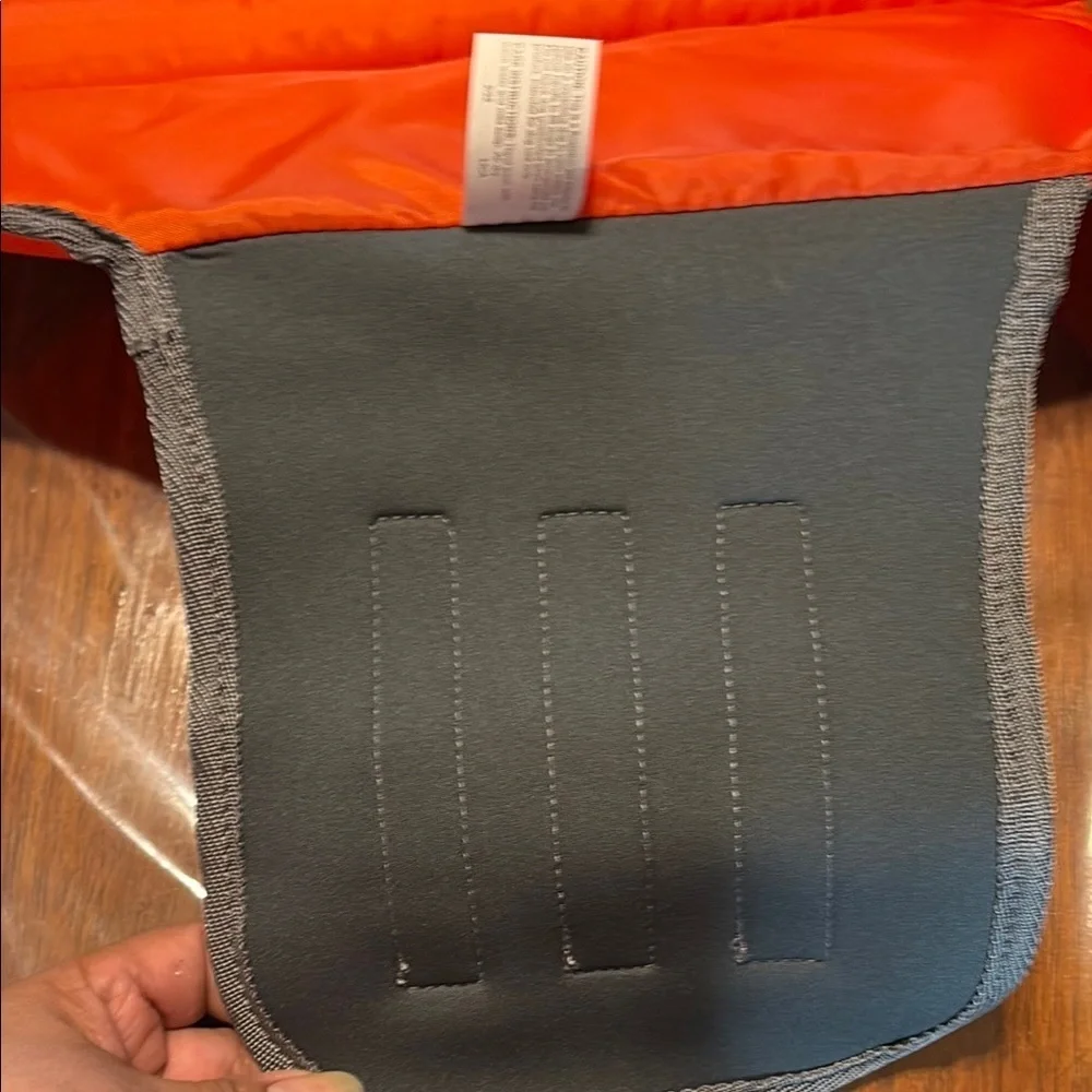 Orange Life Jacket with Black Straps